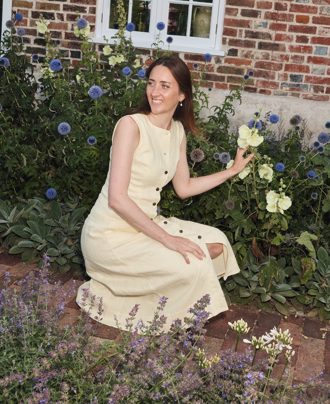 A woman wearing a Hobbs dress.