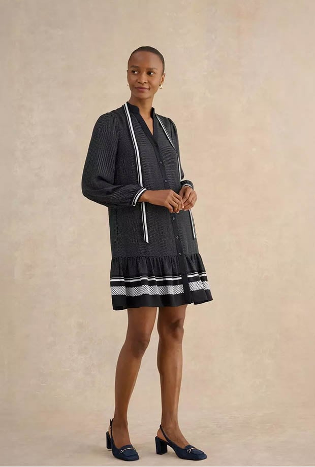 A woman wearing Hobbs dress.
