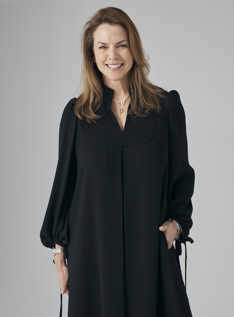 Hobbs Product Director, Sally Ambrose pictured in the loose black, Natasha Dress. 