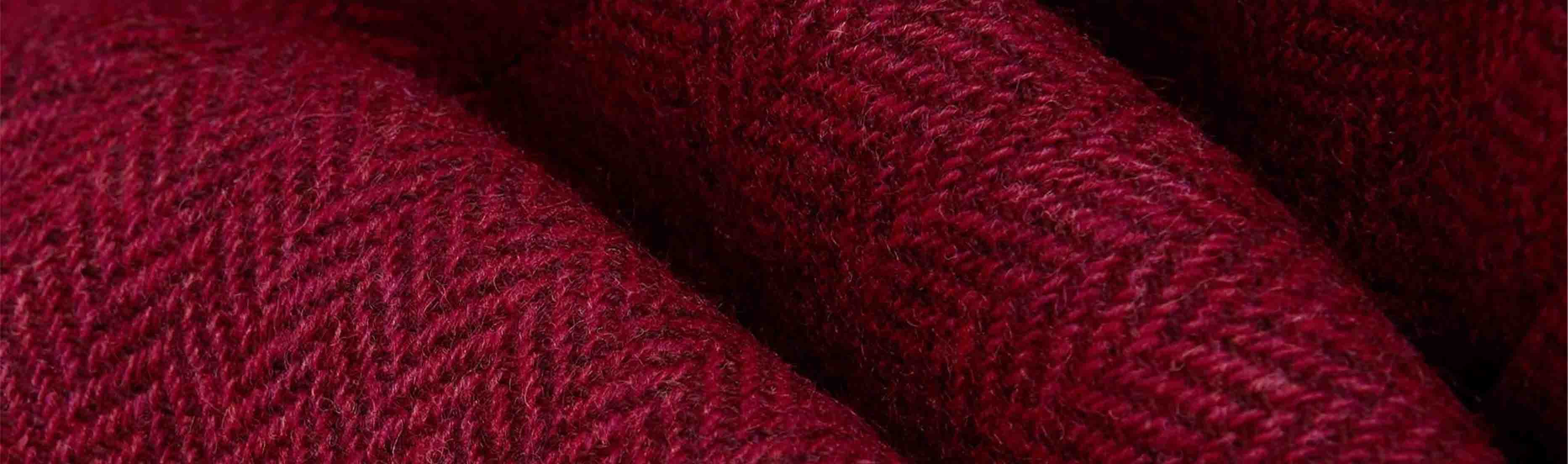 Close-up of a burgundy jacket.