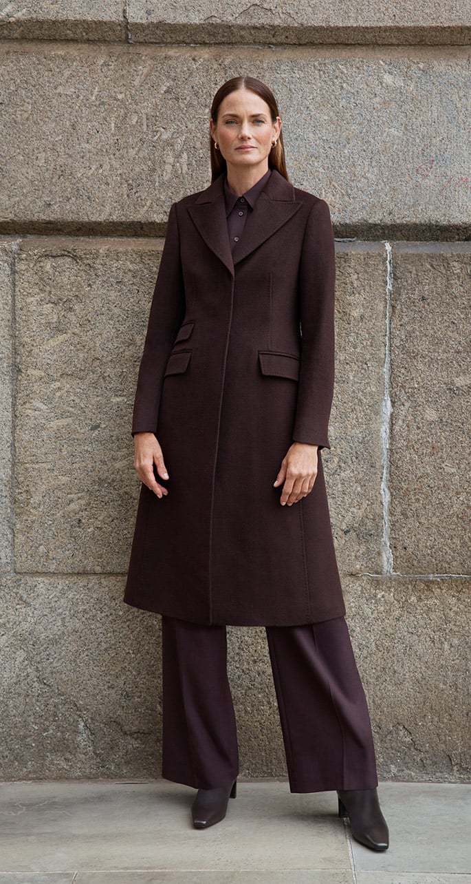 A woman wearing a Hobbs wool coat.
