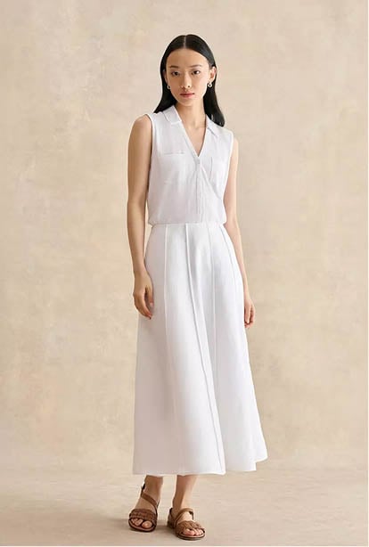 A woman wearing a Hobbs dress.