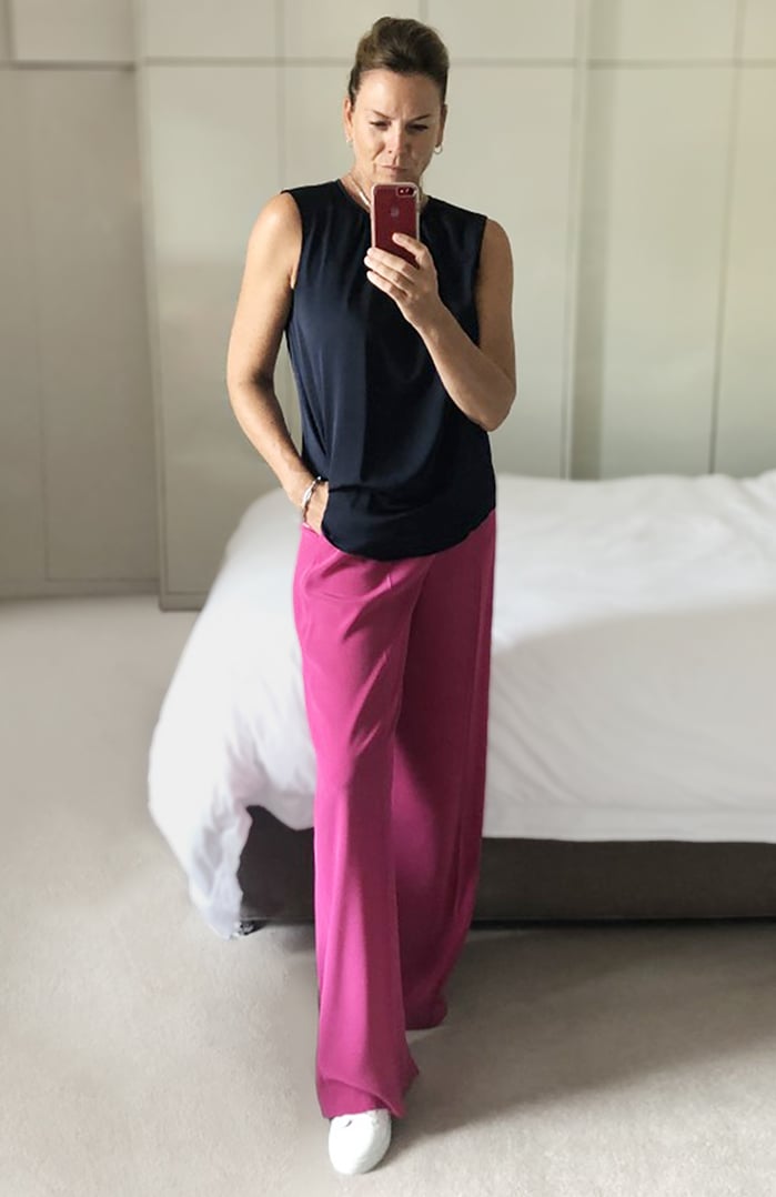 When you want to stand out pairing classic navy with a bright pink pair of palazzo style trousers works a treat.