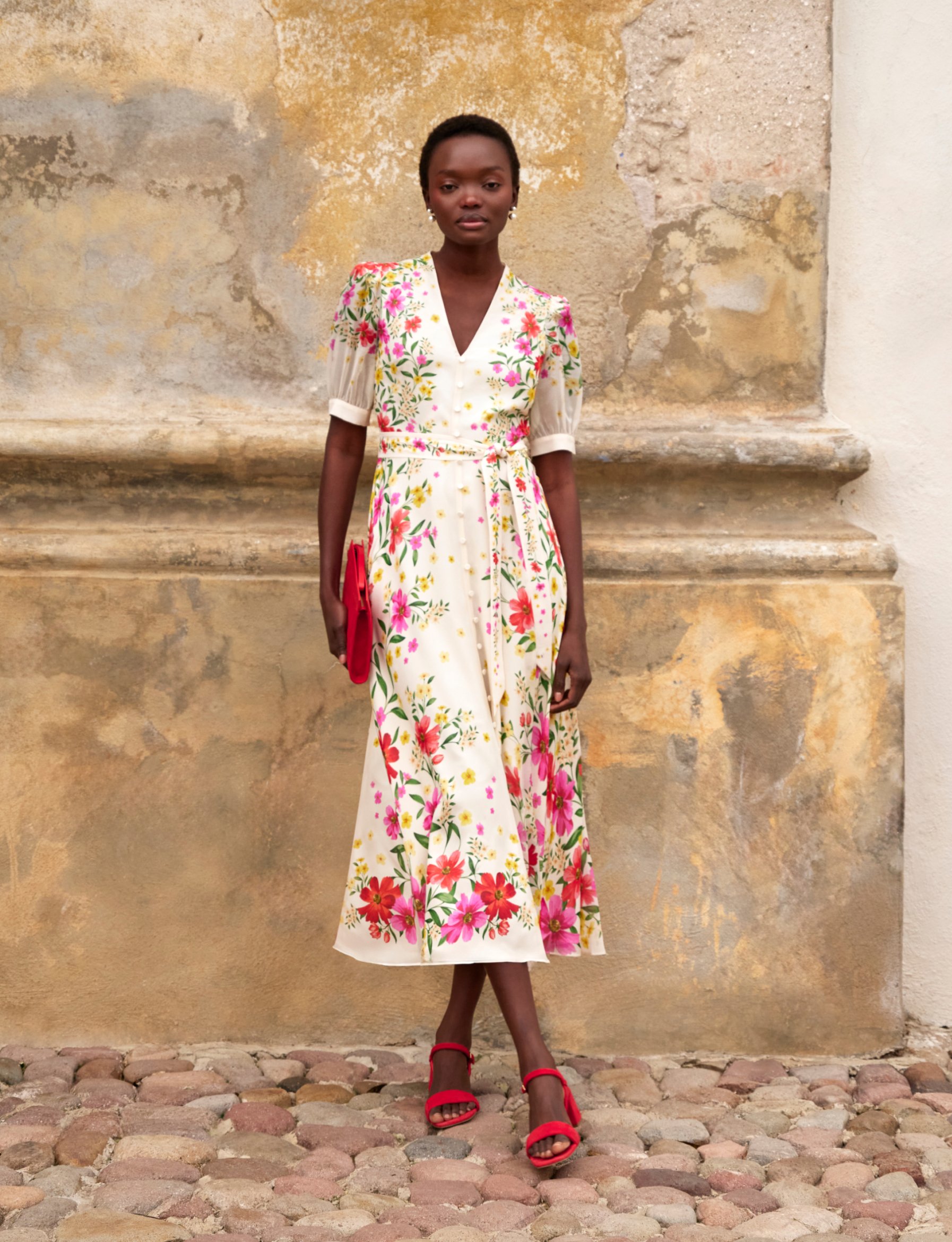HOBBS MODEL WEARING IVORY SILK DRESS WITH FLORAL PRINT
