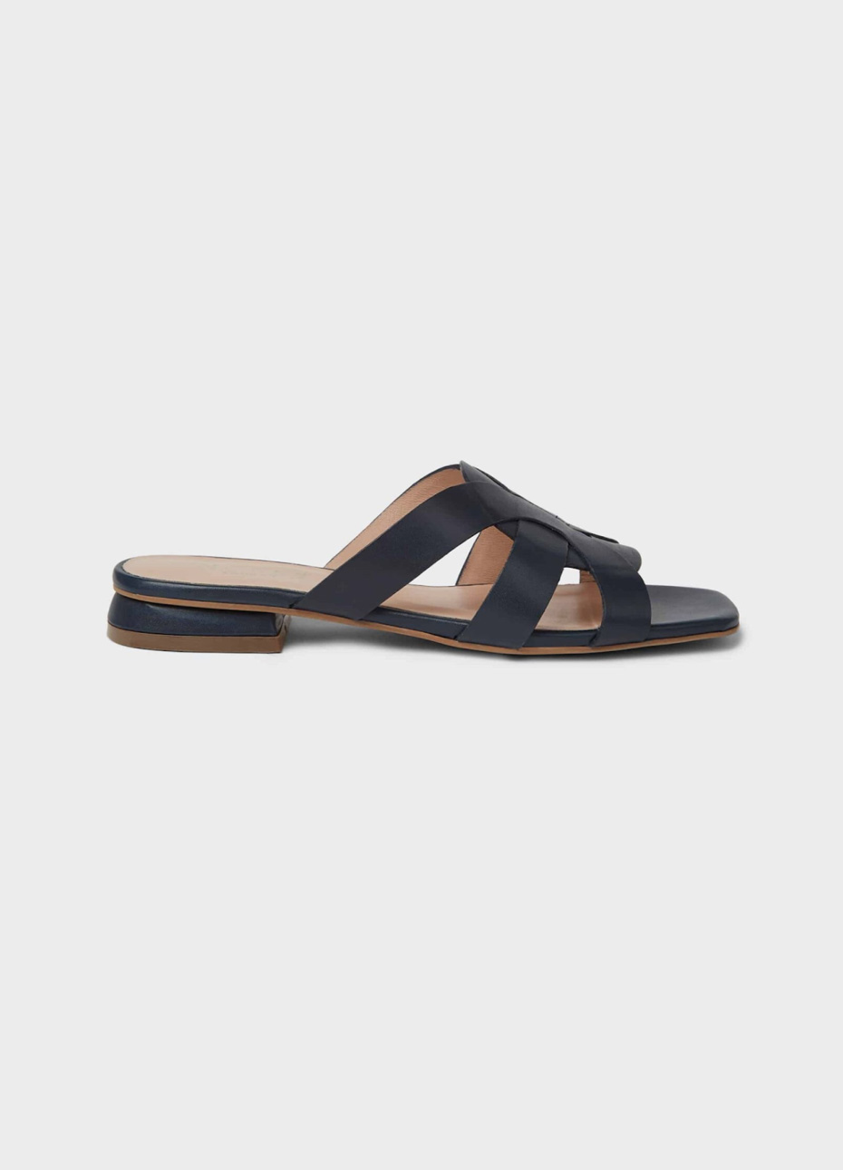 Hobbs flat leather sandal with an open back in black.