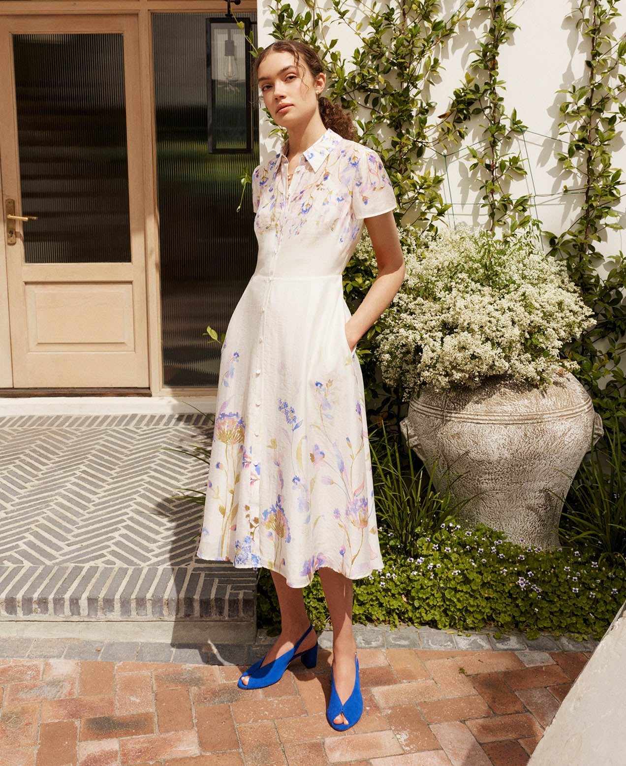 A woman wearing a Hobbs shirt dress