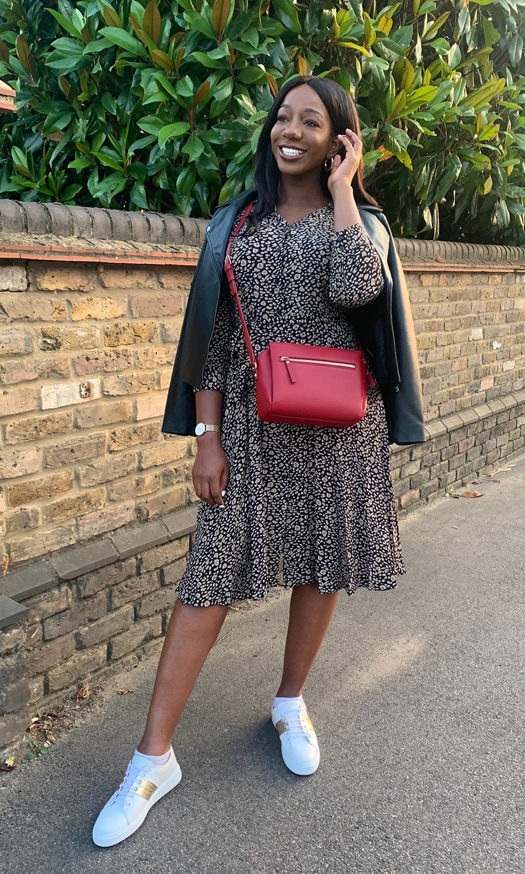 Jessica wears show how to casually style the Hobbs rosaline dress with trainers, cross body bag and leather jacket