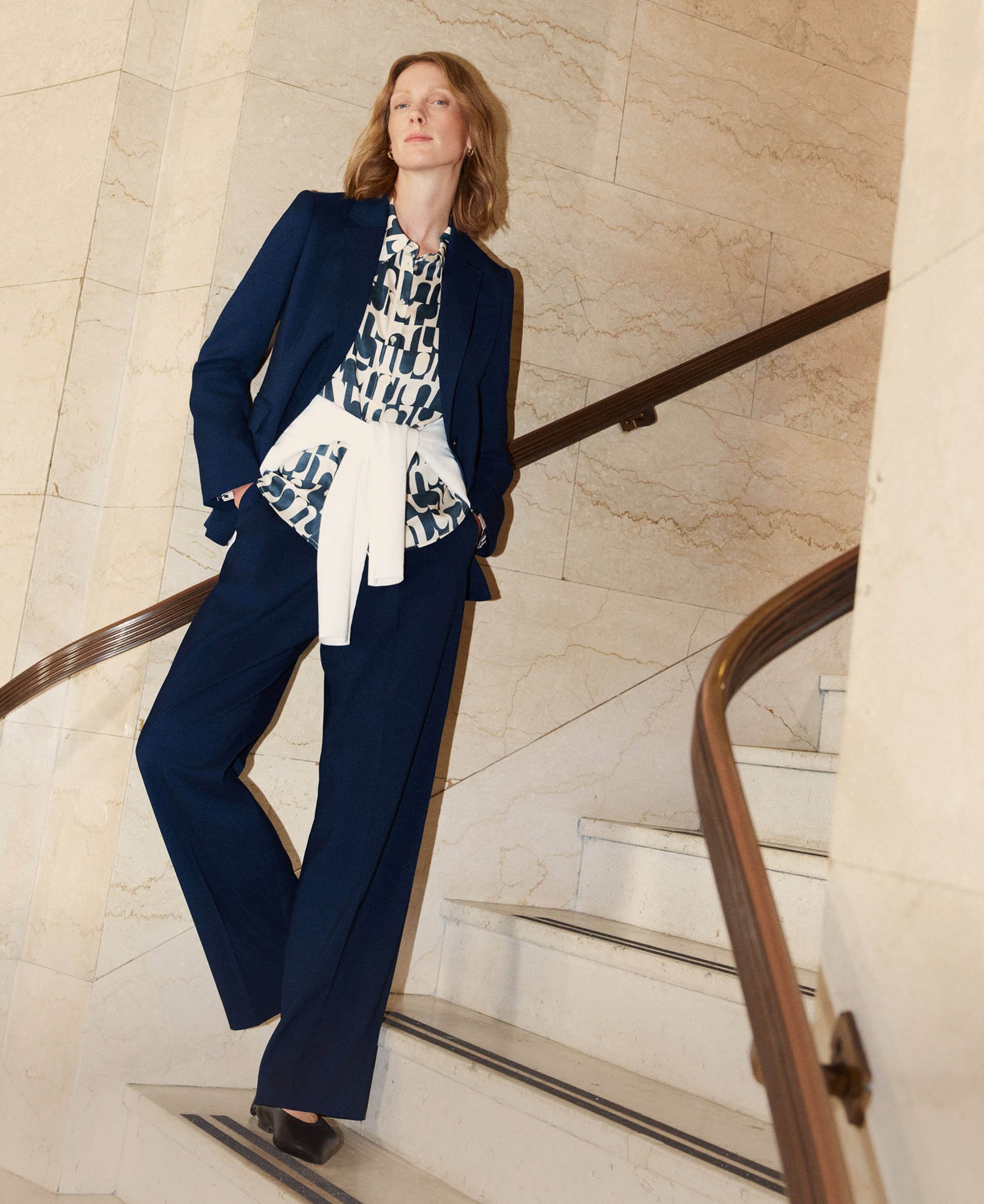 Women wearing Hobbs' new suits.