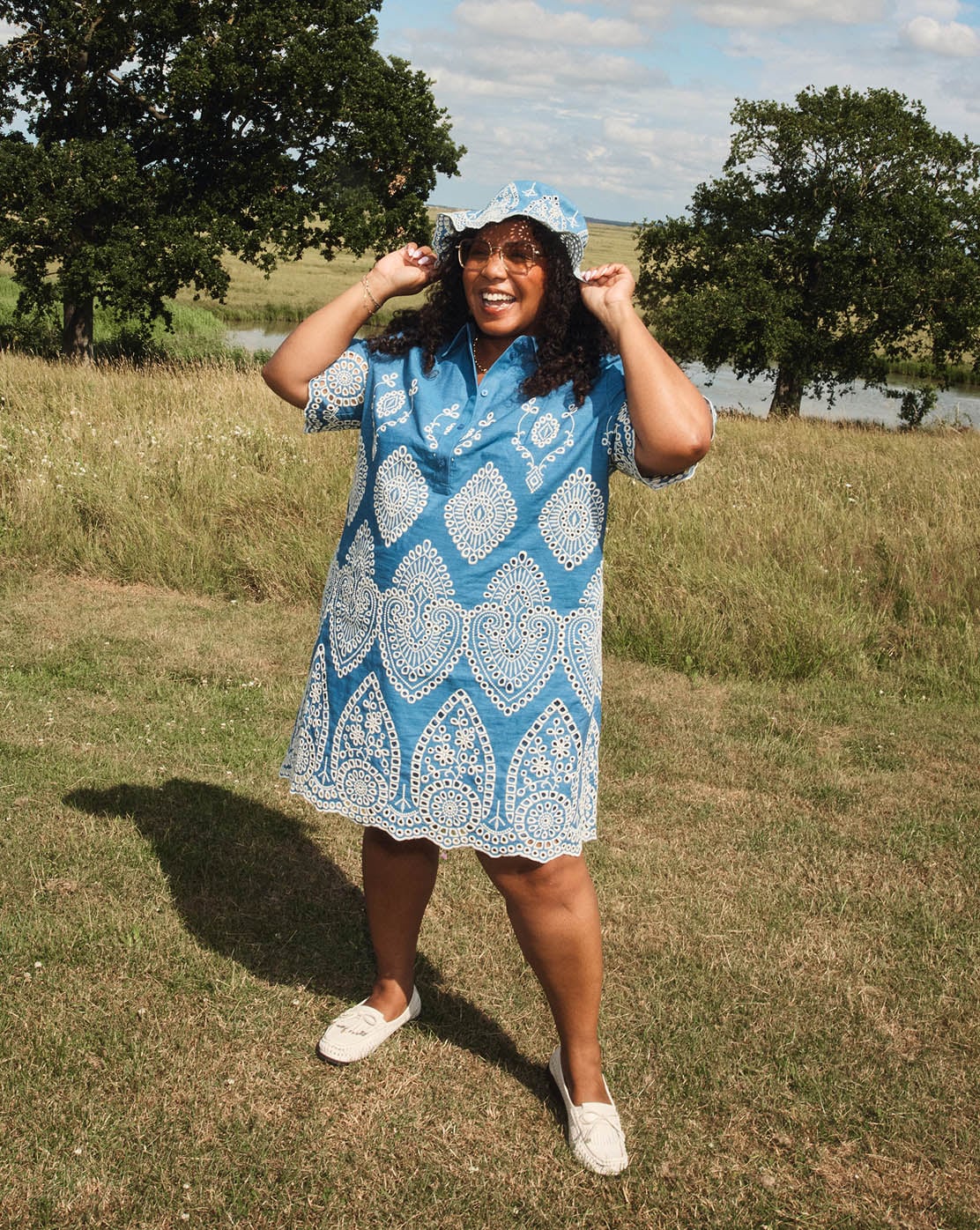 A woman wearing a Hobbs dress.