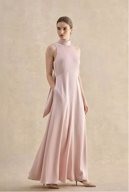 A woman wearing a Hobbs dress.