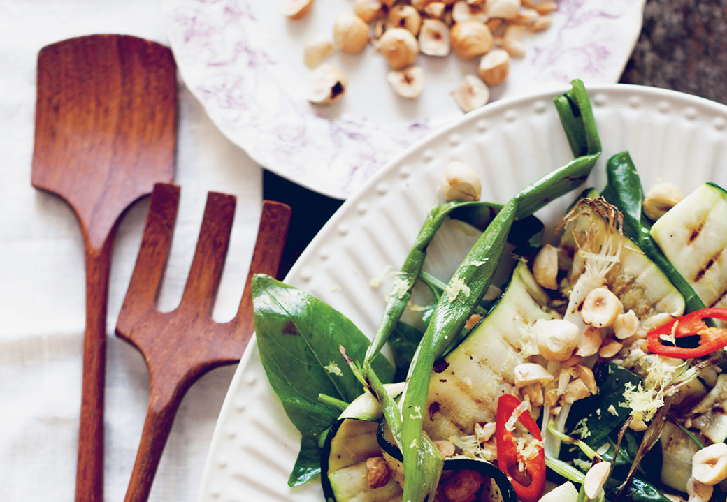 Sarah Britton's Grilled Courgette with Spring Onion and Hazelnut styled on a plate