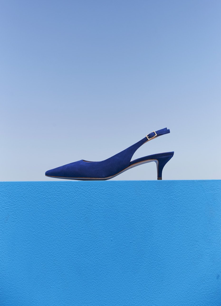 Kitten heeled sandals in blue with a slingback feature by Hobbs. Wear with neutral toned occasion dresses and trouser suits.