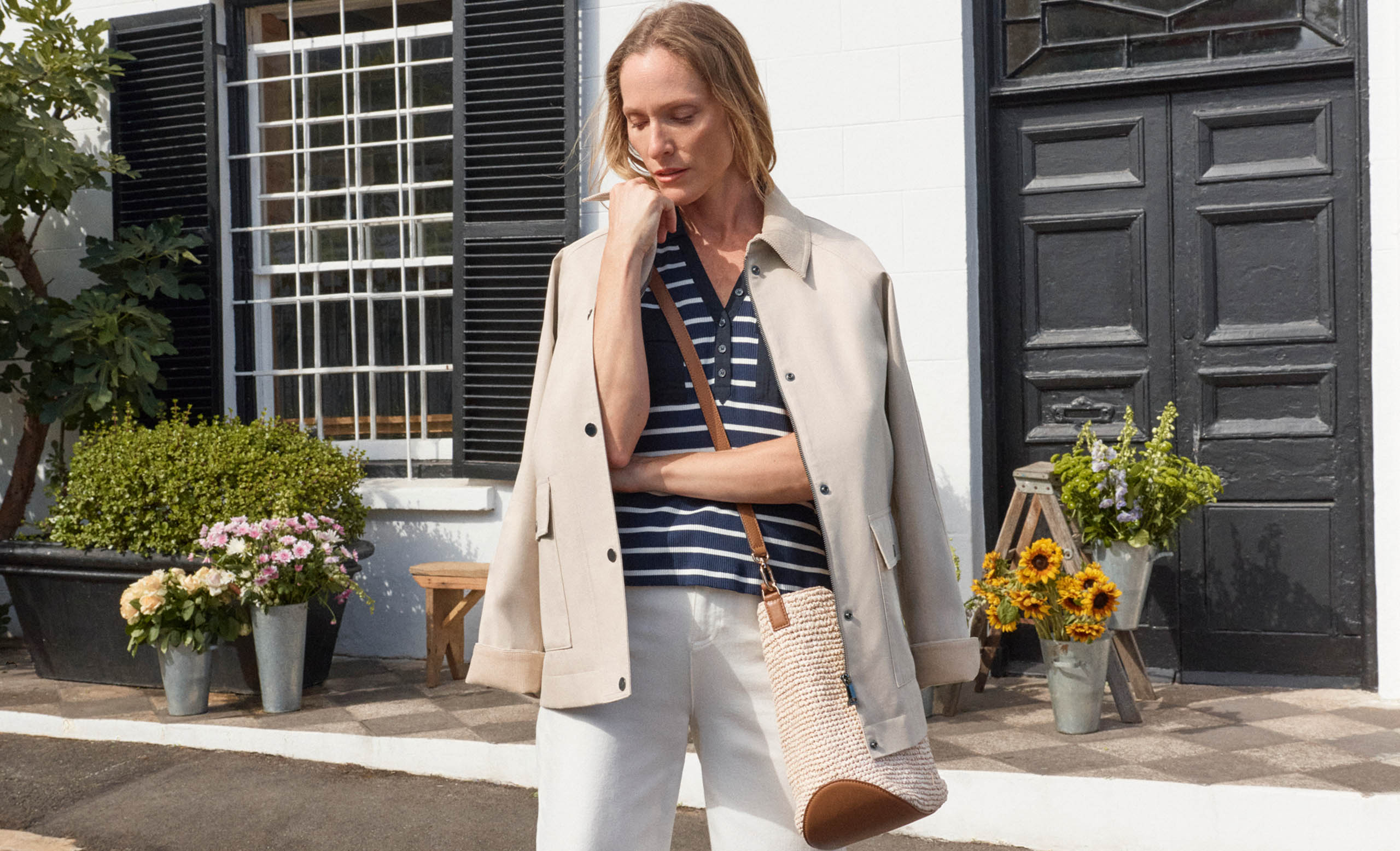 A woman wearing a Hobbs dress.