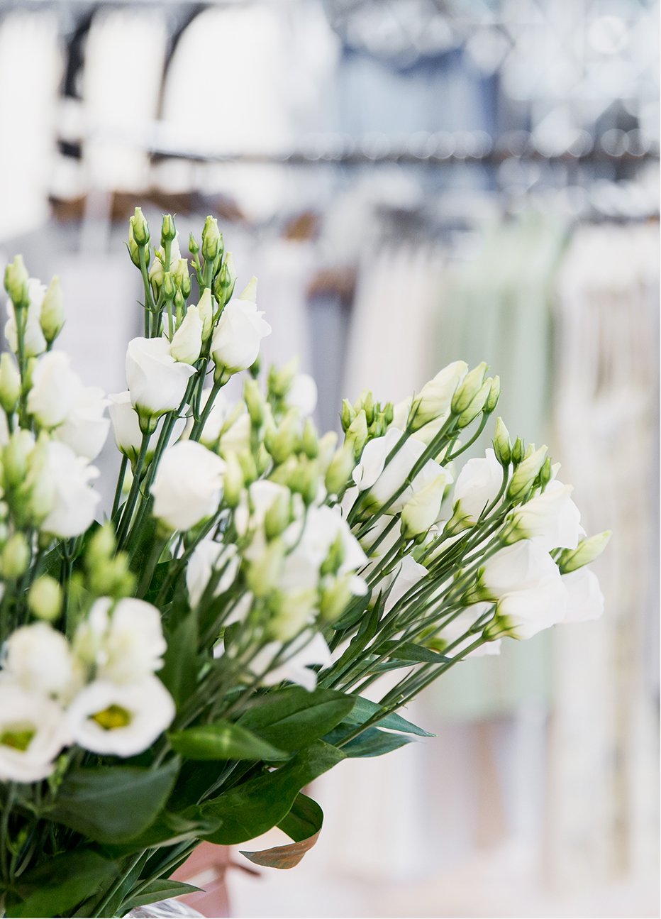 White fresh flowers feature in store.