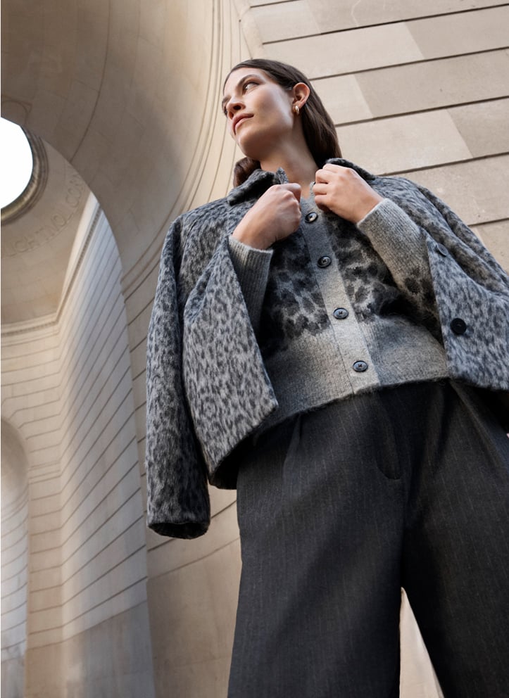 Model photographed in leopard coat.
