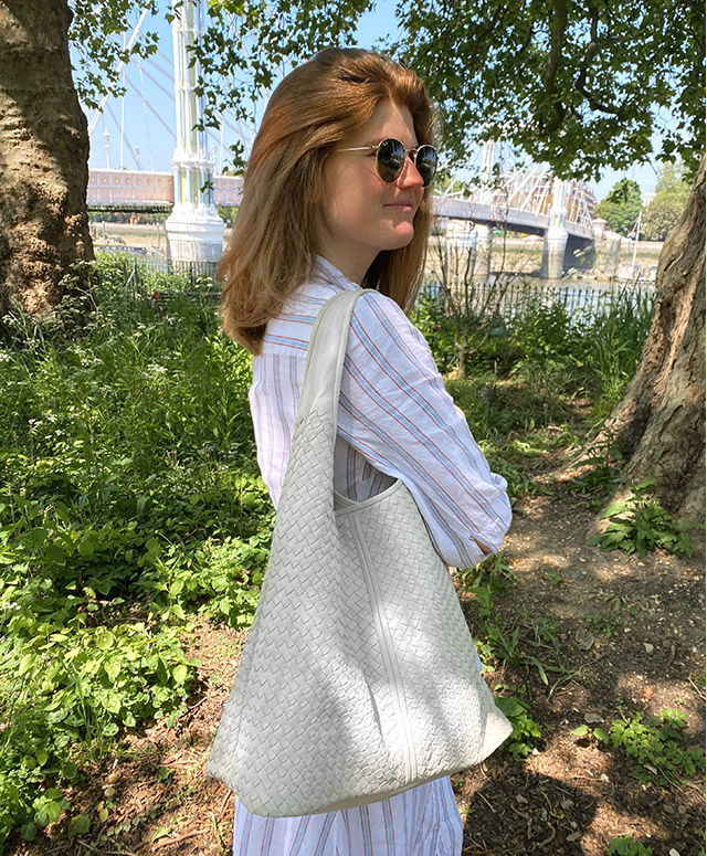 Content creator @molliemoore_ photographed at Battersea Park in London wearing Hobbs' Ciara linen dress.