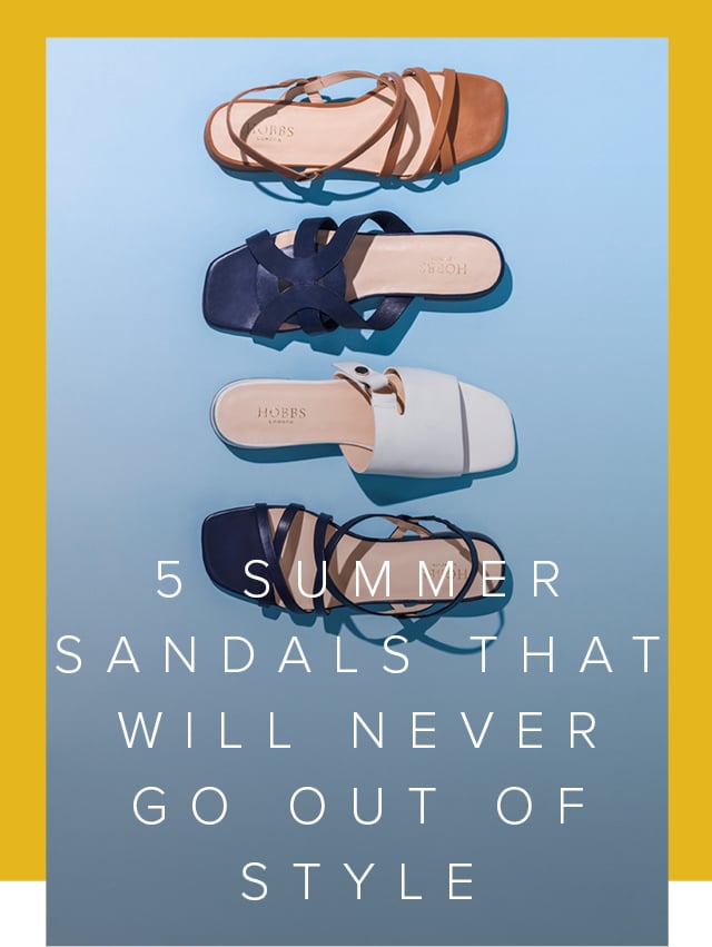 Four summer sandals from Hobbs against a blue background, from top to bottom: Brown sandal, dark blue sandal, white sandal, black sandal.