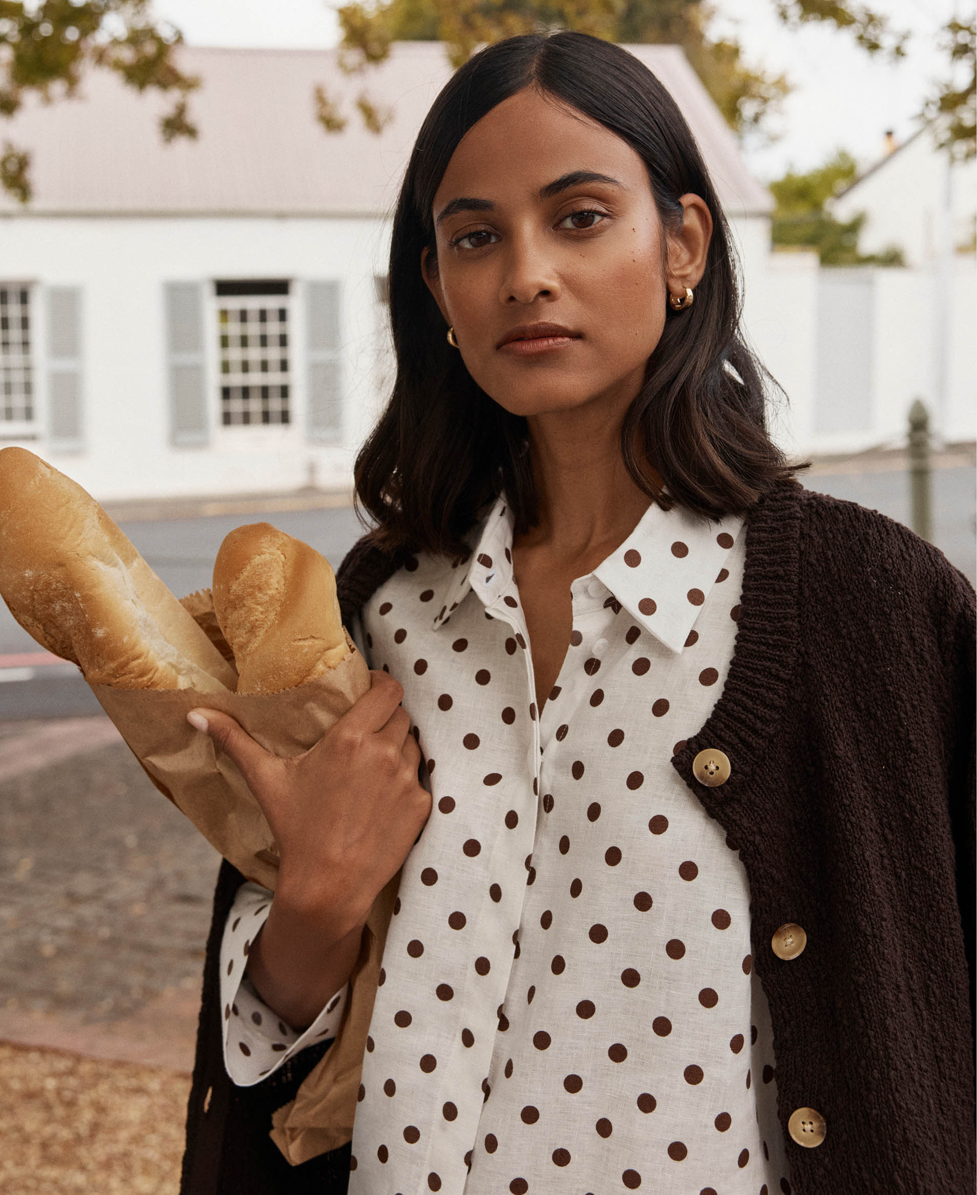 A woman wearing Hobbs polka dots.
