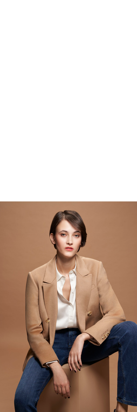 Model photographed against a pink backdrop wearing pink clothing styled in different ways.