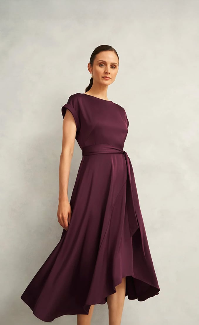Women wearing Hobbs trend-leaning occasion dresses.