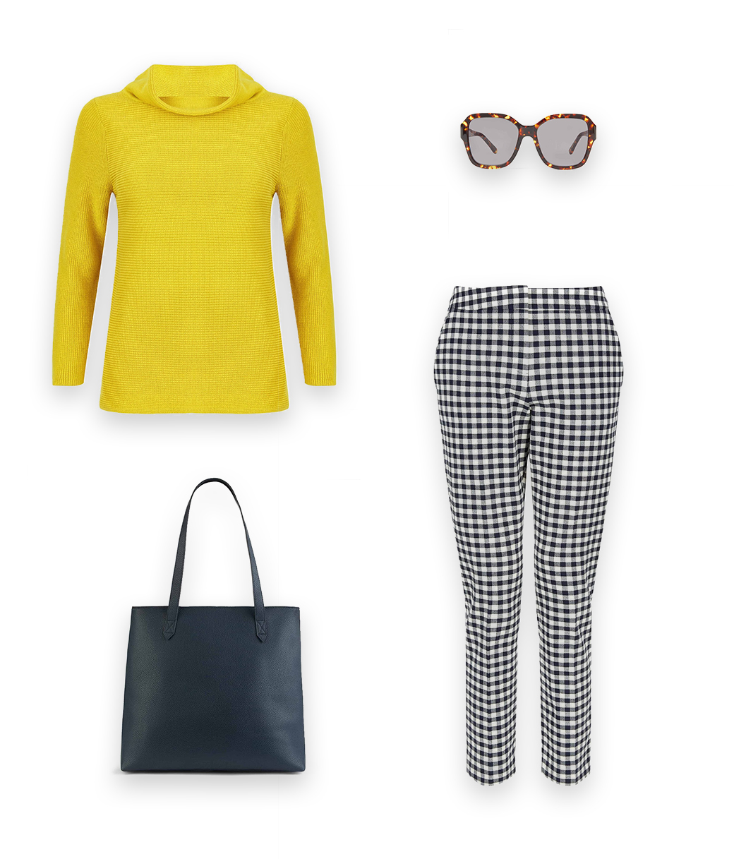 An effortless jumper outfit idea, style a yellow roll neck jumper with navy blue and white checked cropped trousers, sunglasses and a dark blue leather tote bag