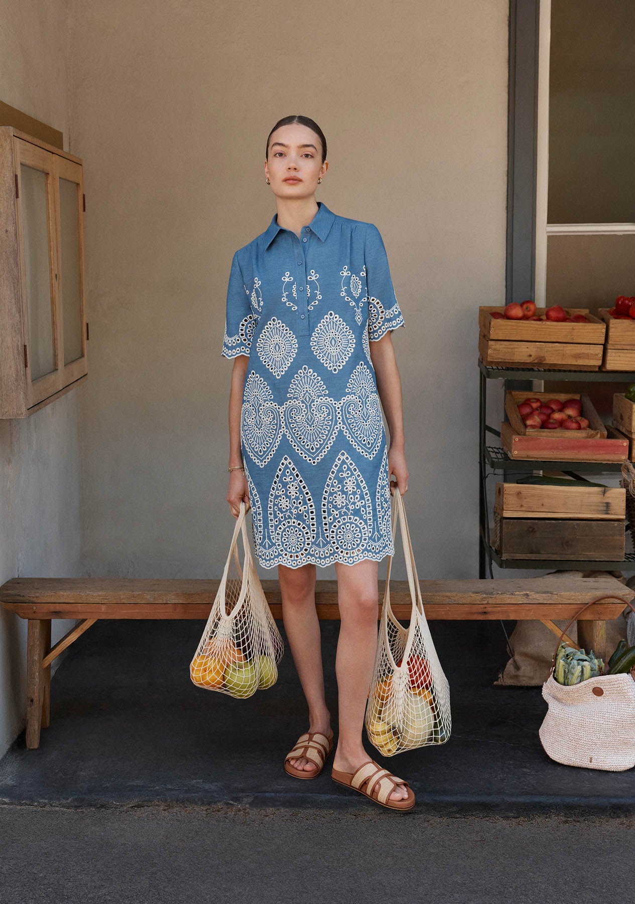 A woman wearing a Hobbs fit and flare dress