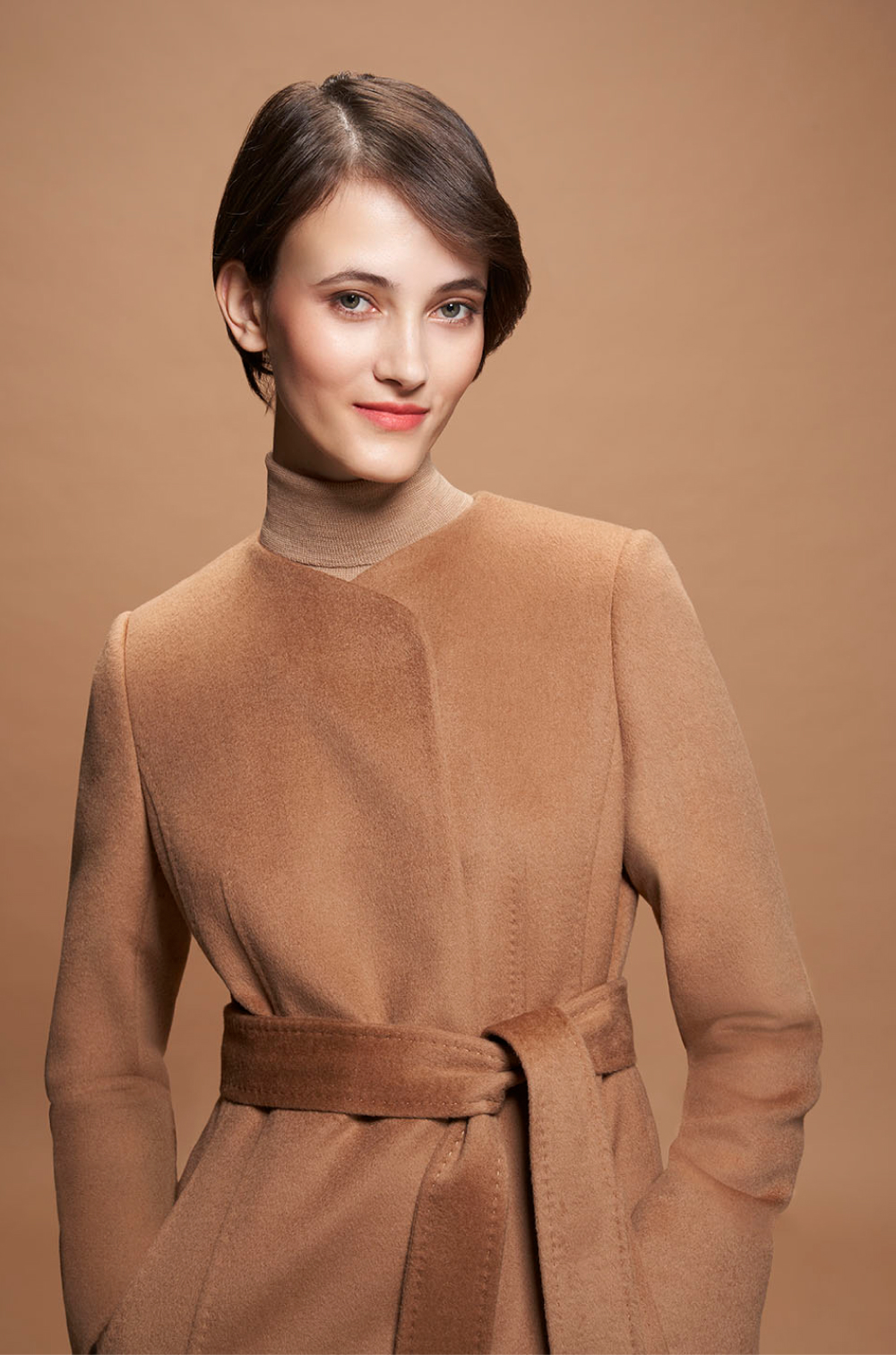 Model photographed against a pink backdrop wearing pink clothing styled in different ways.